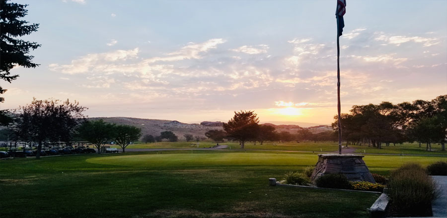 image of golf course at sunset